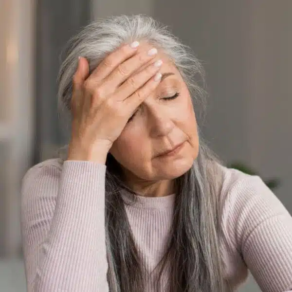 senior woman stressed on laptop