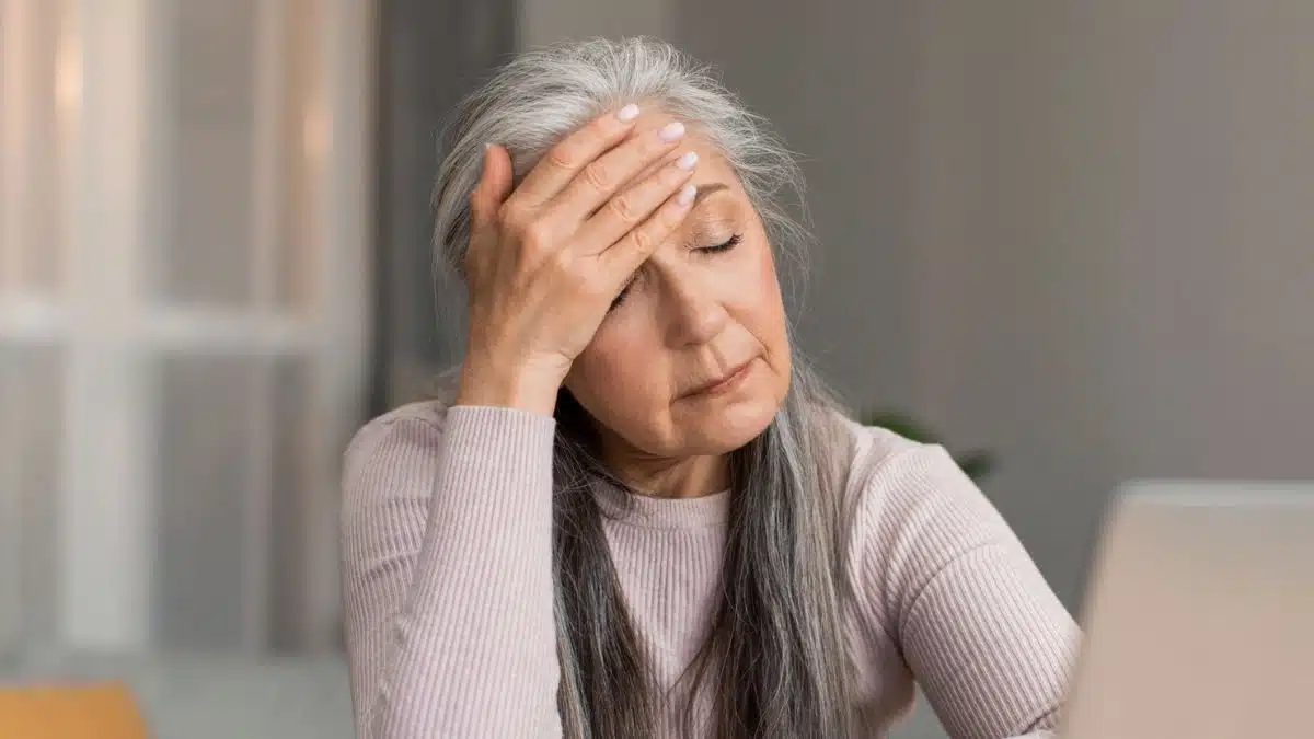 senior woman stressed on laptop