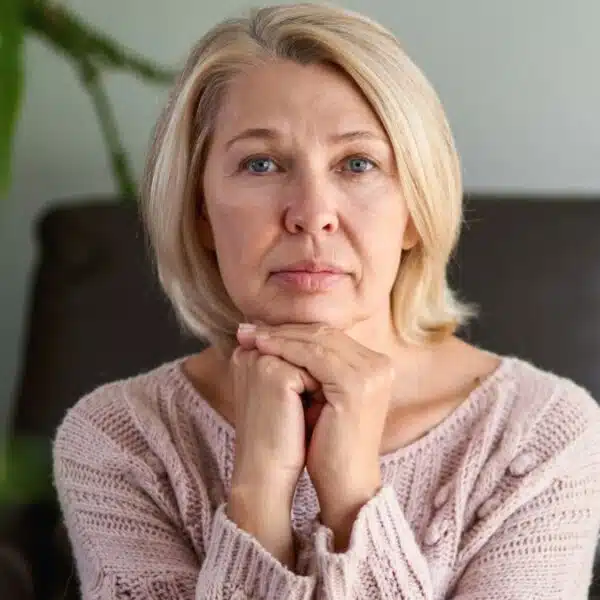 senior woman worried at home