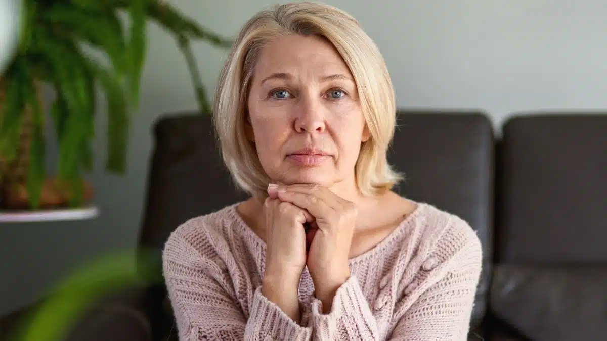 senior woman worried at home