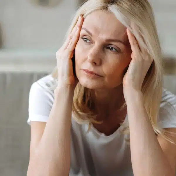 woman at home worried about her problems