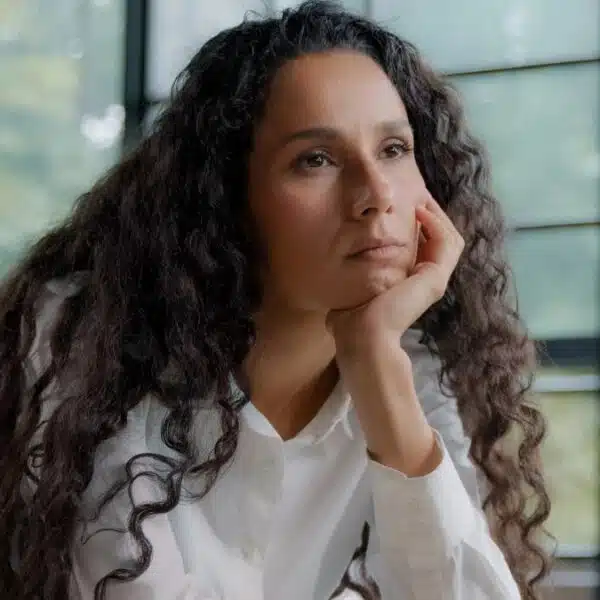woman bored at the office at her desk