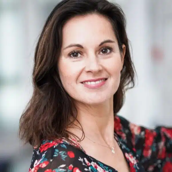woman closing the door in the office