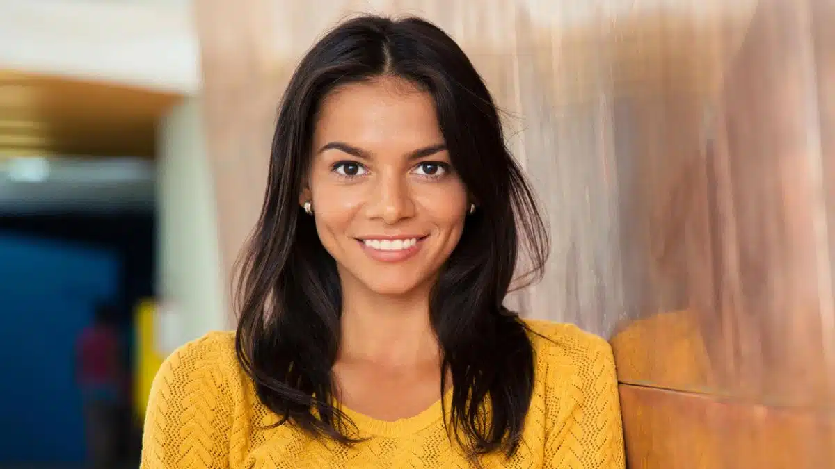 woman crossing arms in the hallway