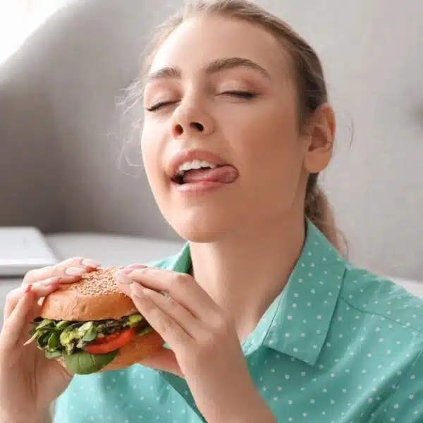 woman eating a sandwich