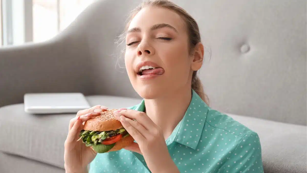 woman eating a sandwich