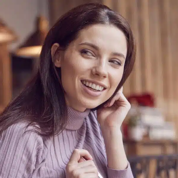 woman happy at a coffee shop