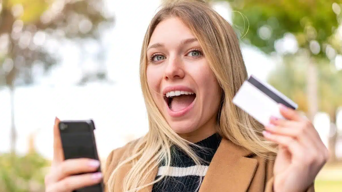 woman happy with her credit card