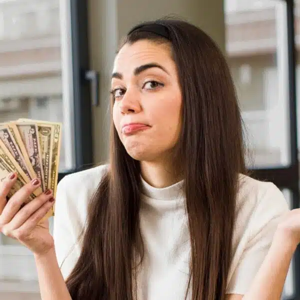 woman holding cash in the office (1)