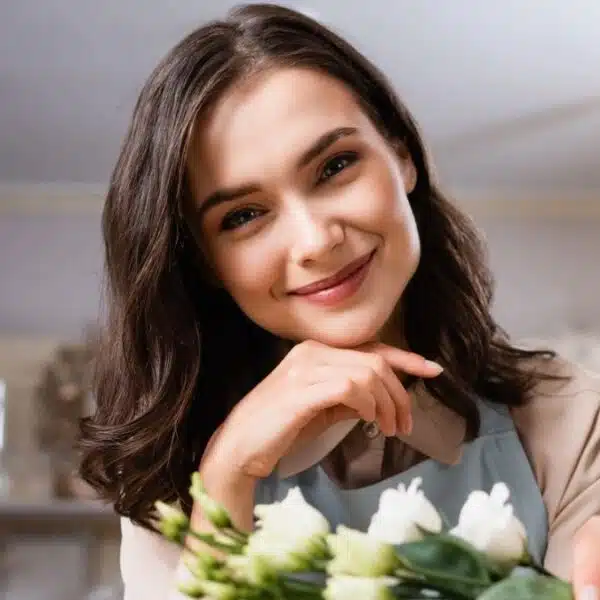 woman holding onto flours