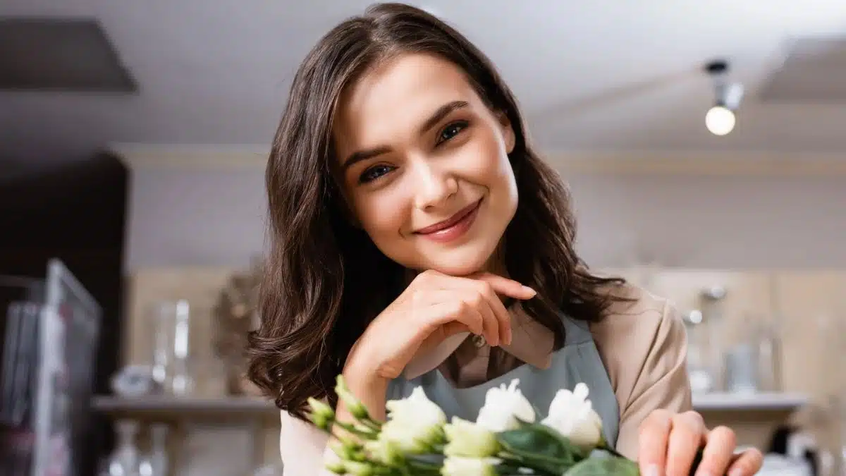 woman holding onto flours