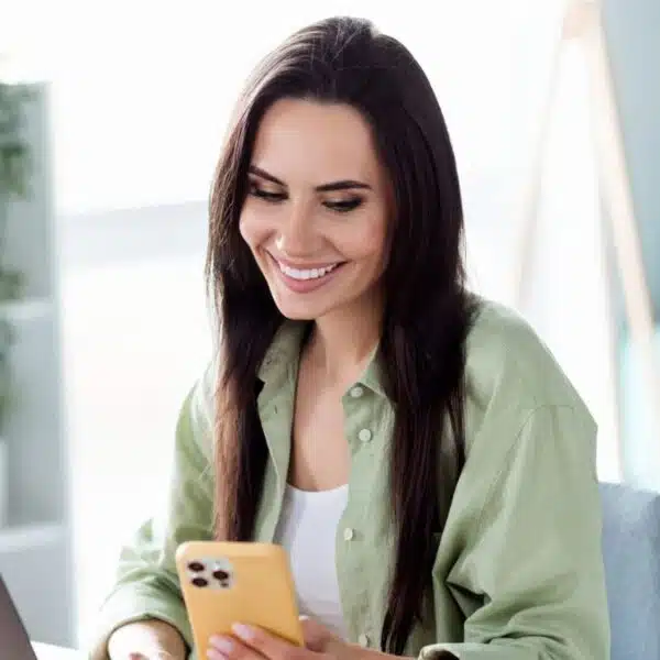 woman looking at her phone