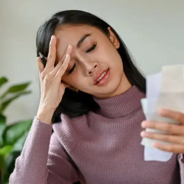 woman reviewing her budget and receipts