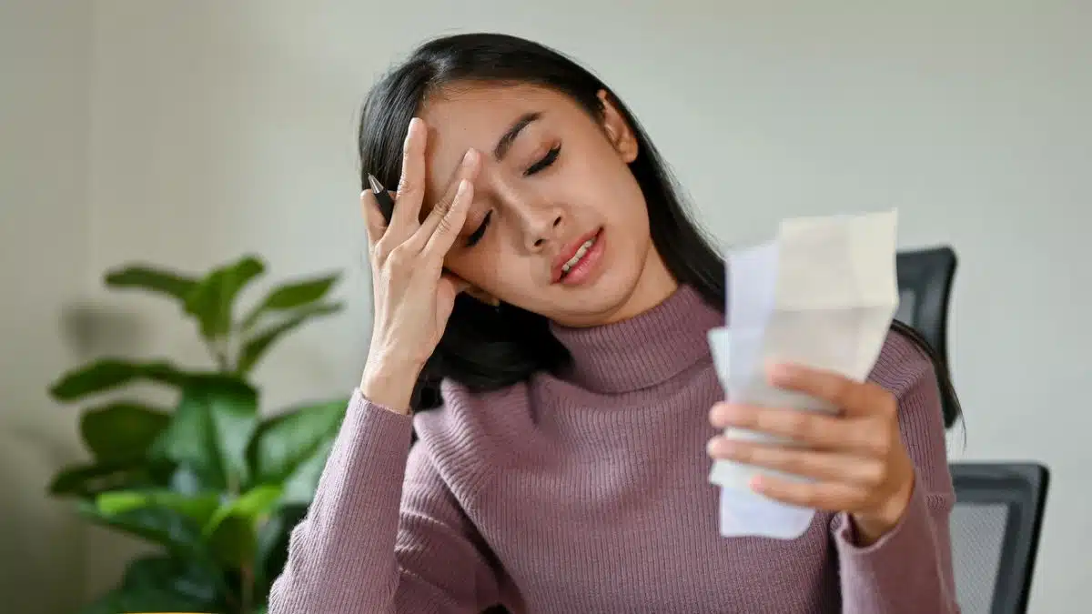 woman reviewing her budget and receipts