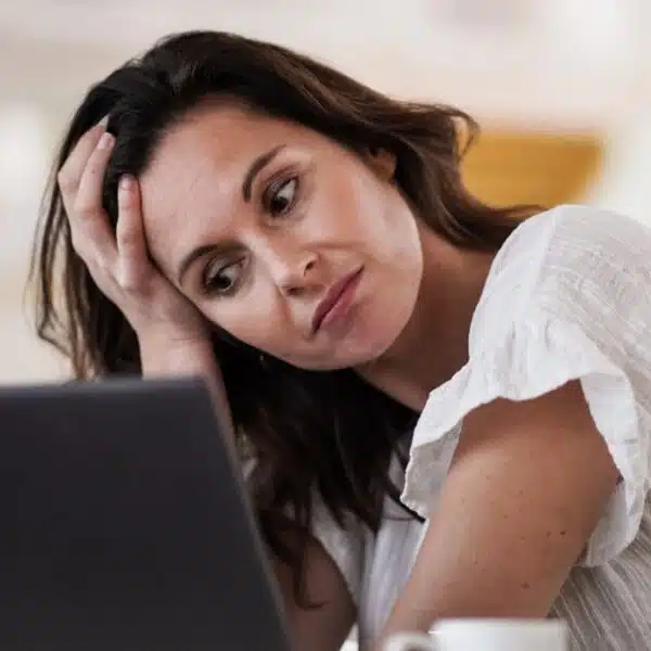 woman sad at her bank account