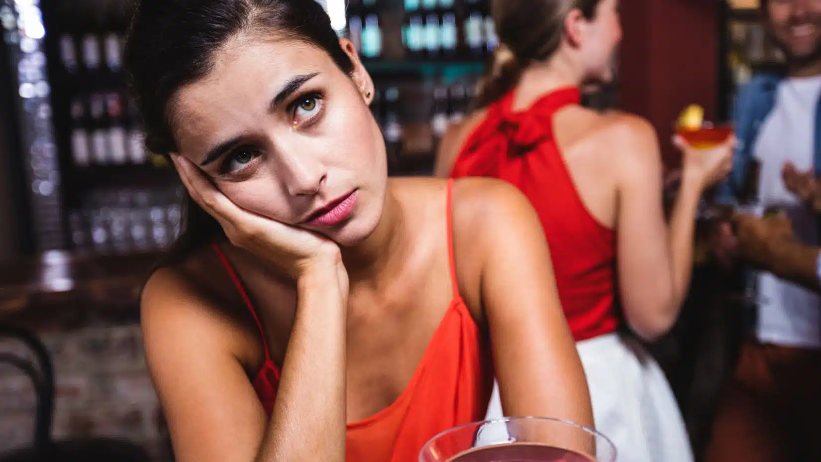 woman sat at a restaurant