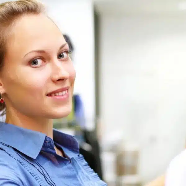 woman shopping holding clothes