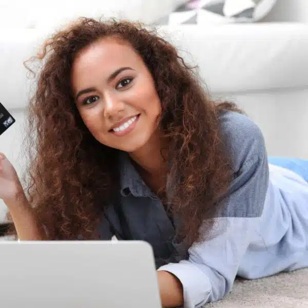woman shopping online with her credit card