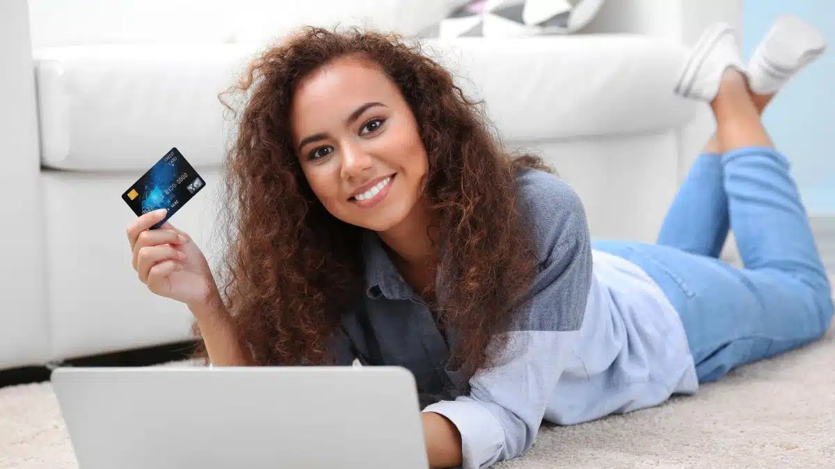 woman shopping online with her credit card