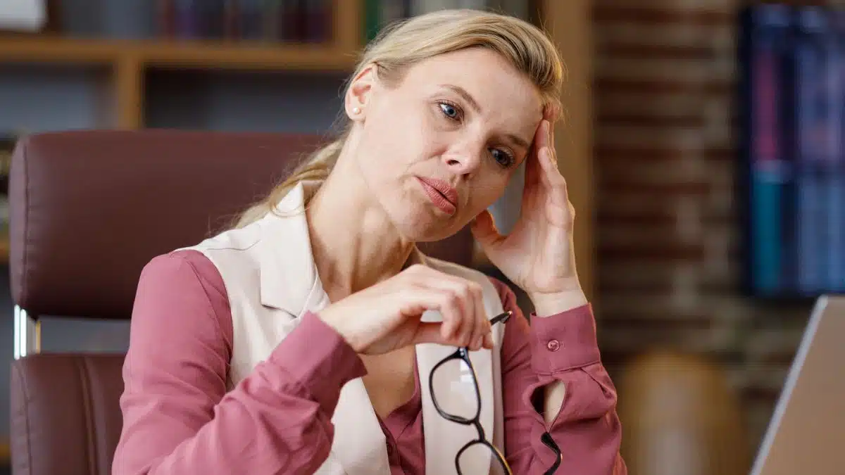 woman stressed at work office