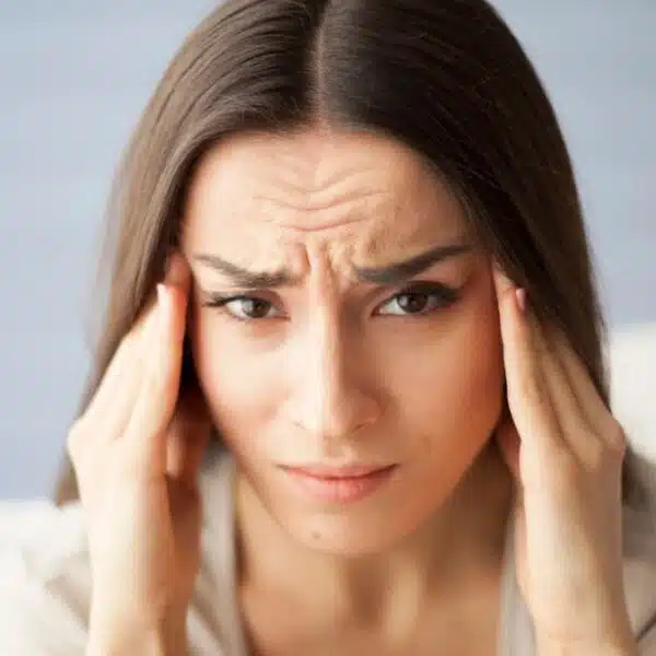 woman thinking hard headache