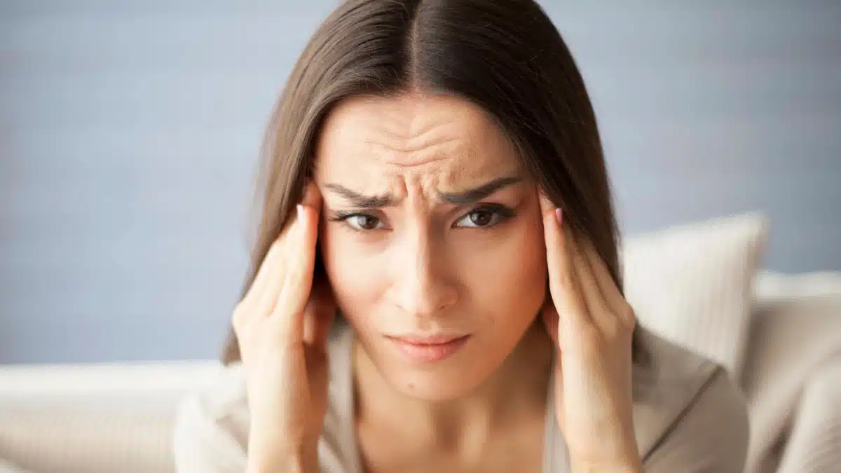 woman thinking hard headache