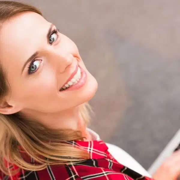woman typing on laptop