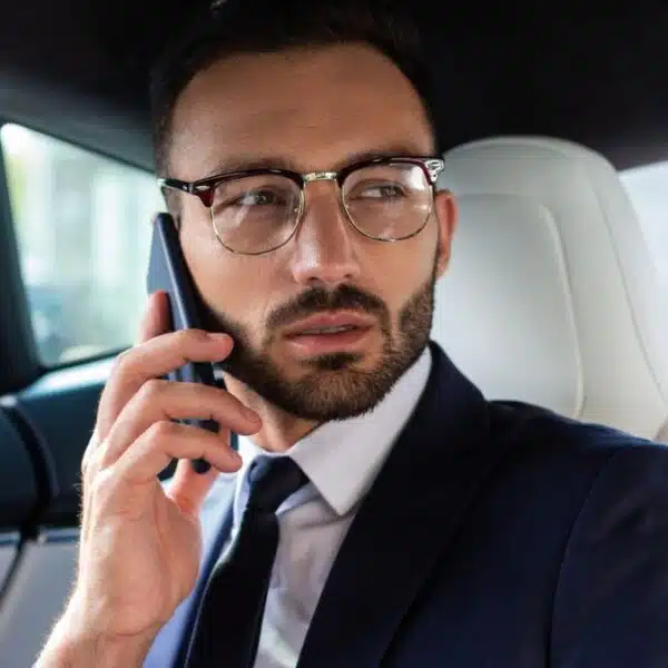 business man glasses on the phone