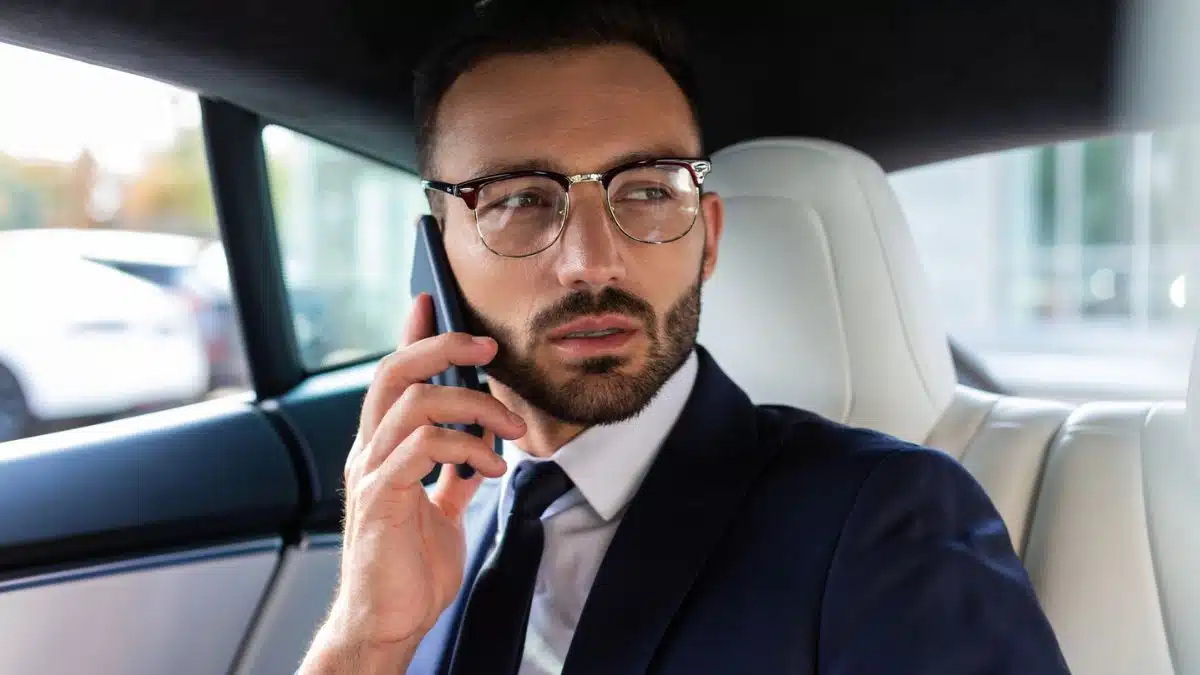 business man glasses on the phone