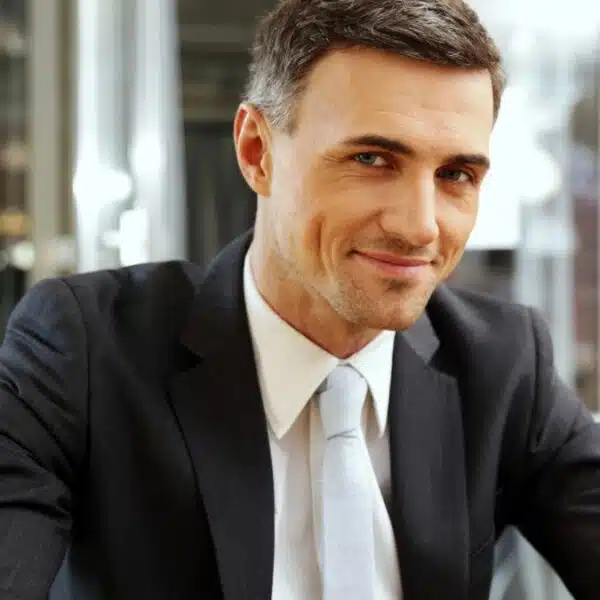 business man smiling at an office