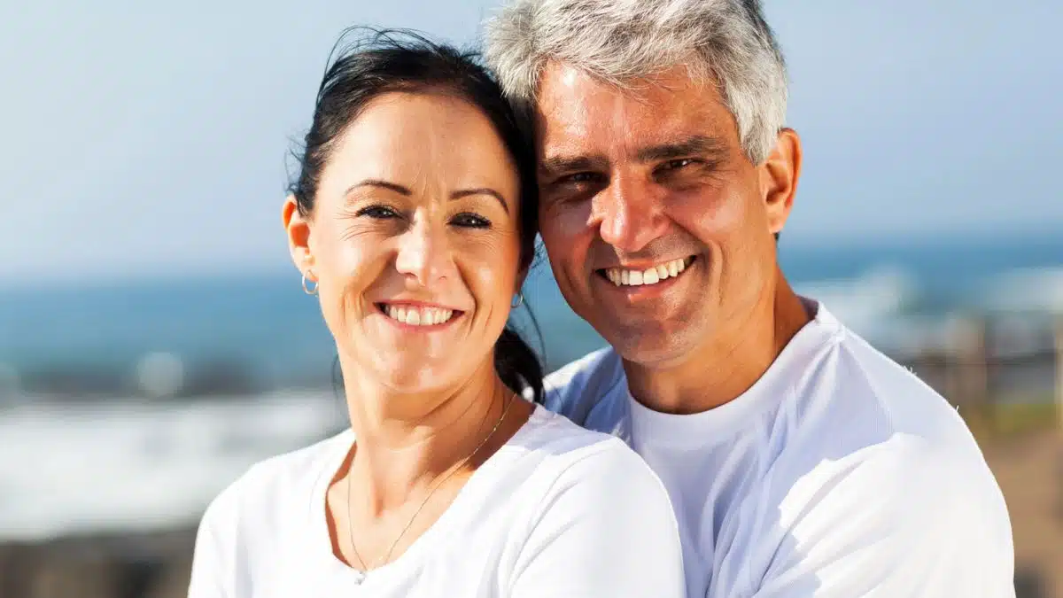 couple hugging on the beach
