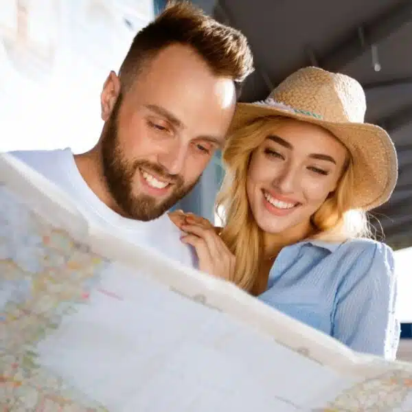 couple looking at map at airport