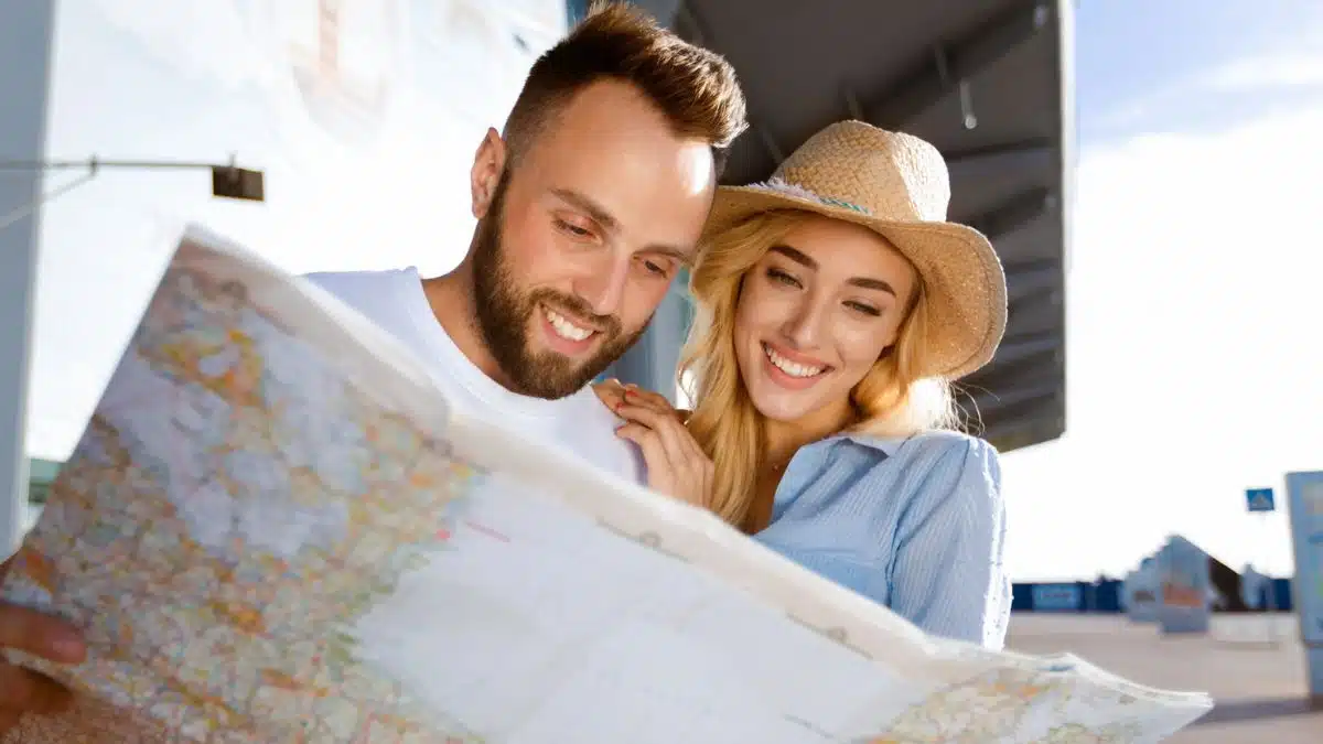 couple looking at map at airport
