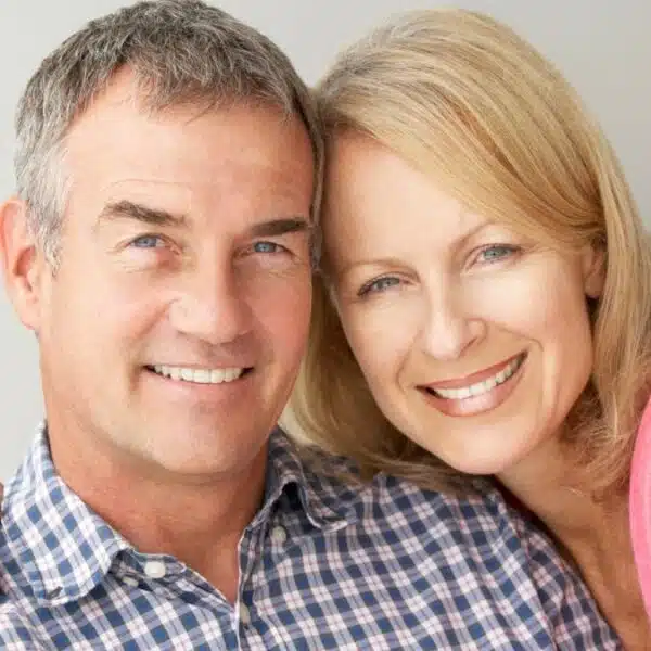 couple sitting on couch mature