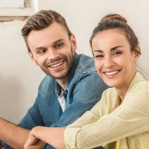 couple sitting repairing