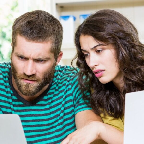 couple staring at bills