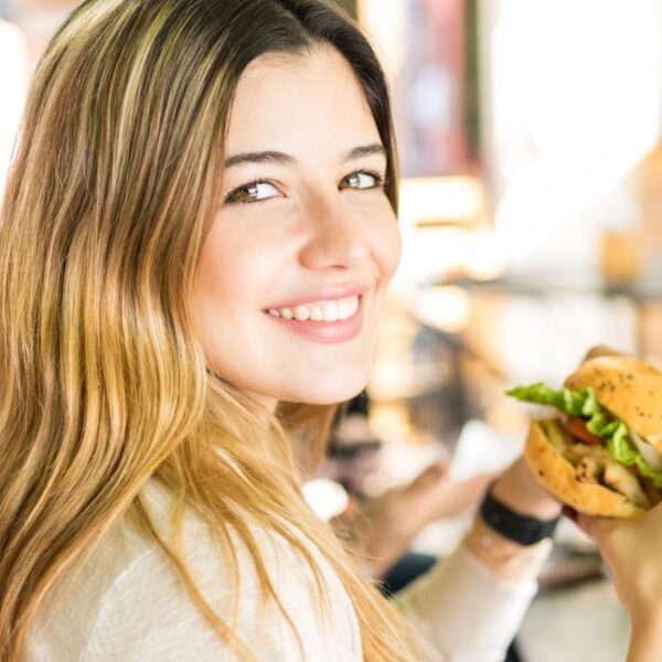 eating a burger at a restaurant
