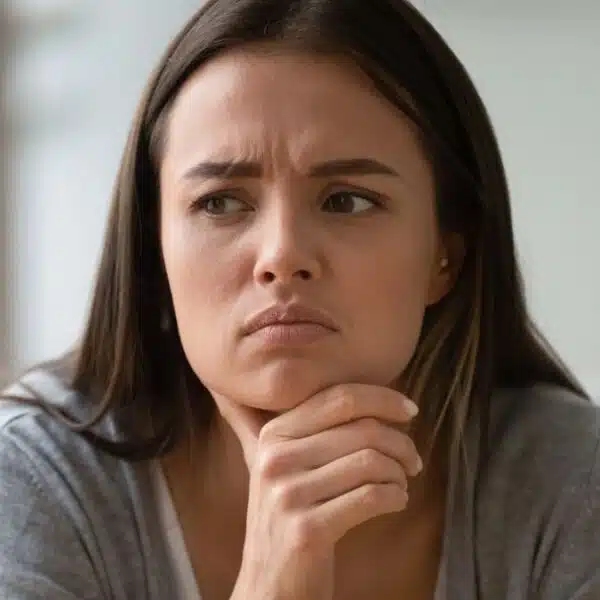 girl stressed in the living room thinking