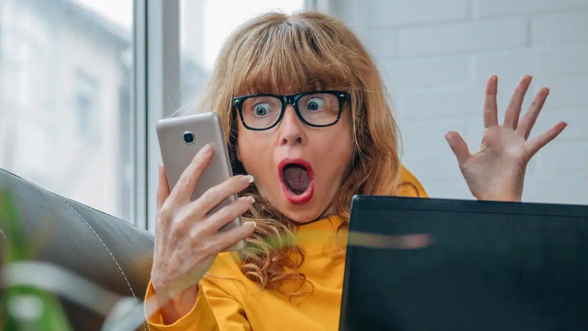 home shocked at the phone