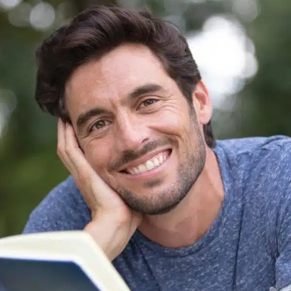 man reading a book in the parker