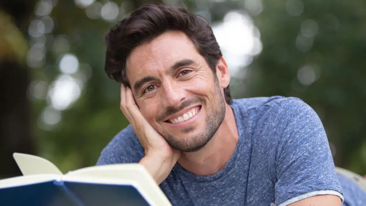 man reading a book in the parker