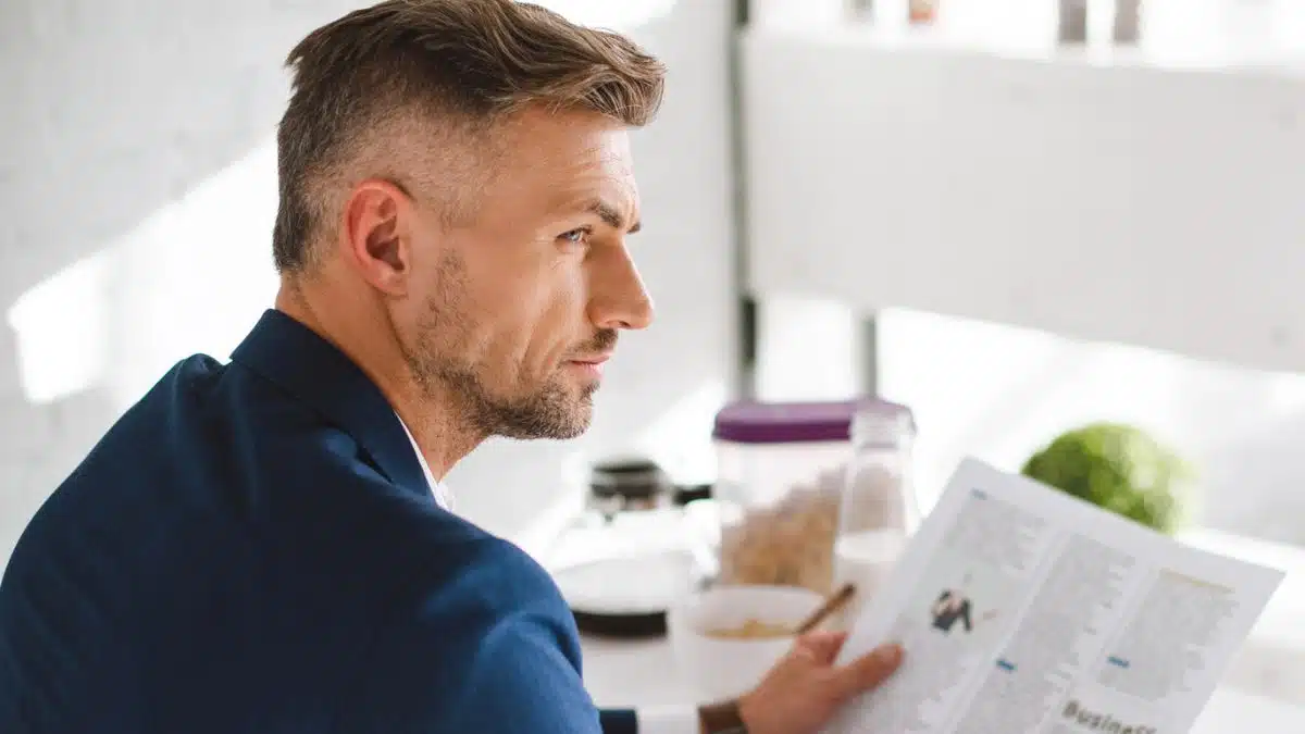 man reading the newspaper
