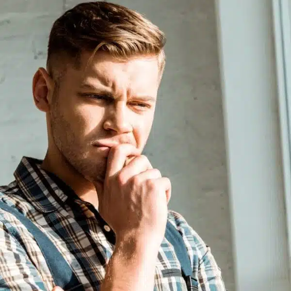 man thinking at the window