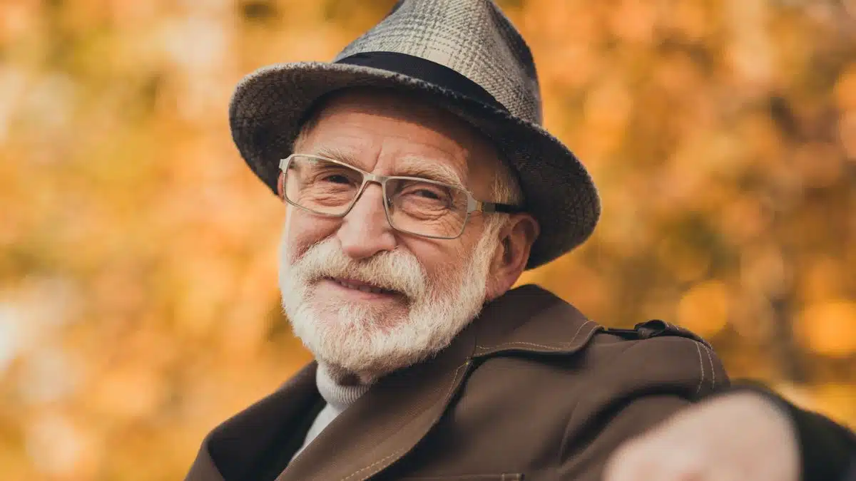 mature man hat in the fall time