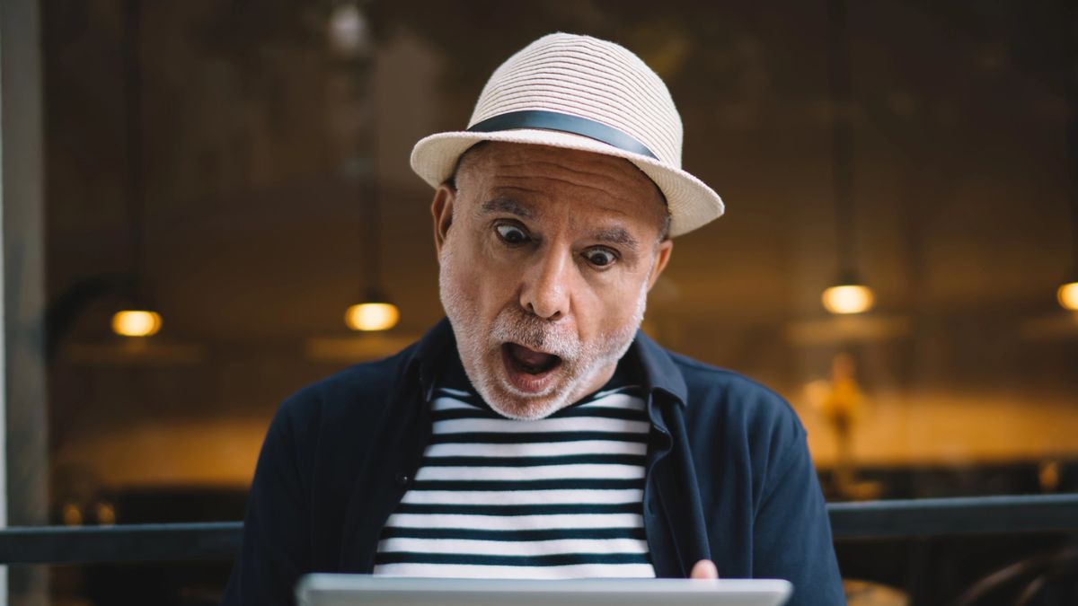 mature man look at his mail