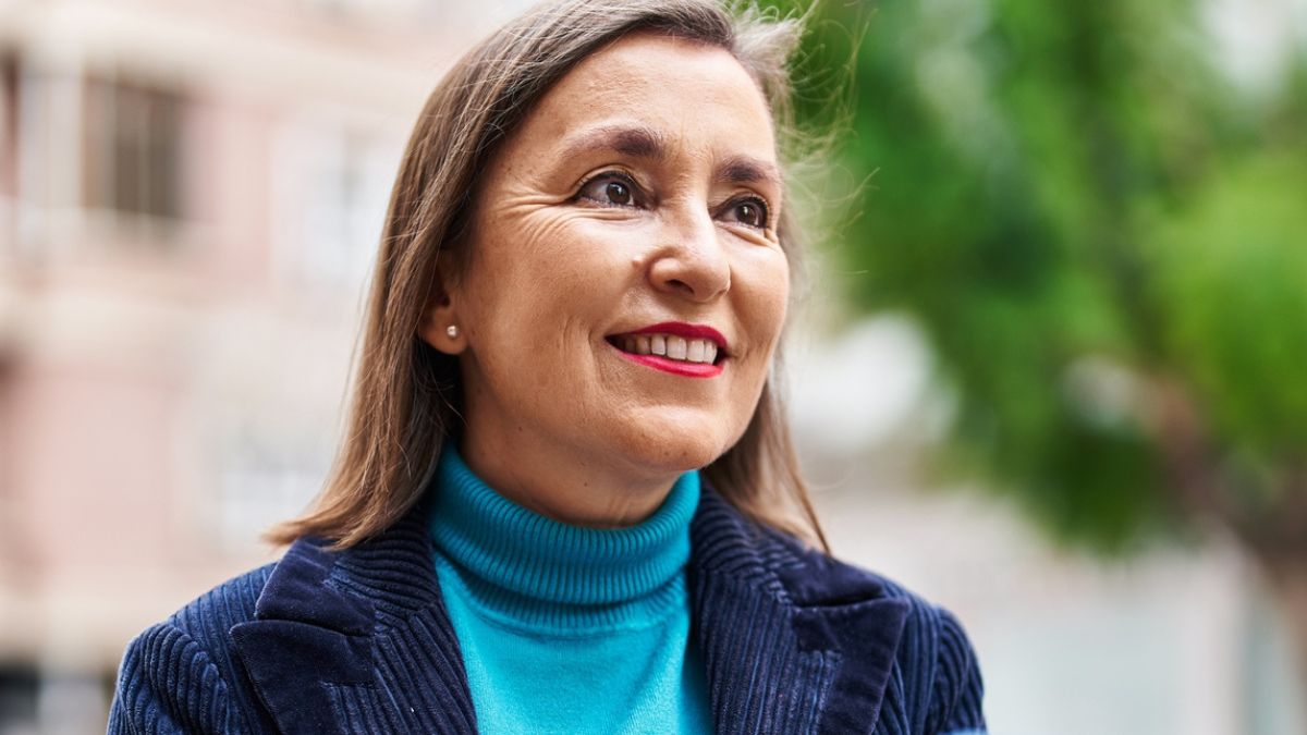 mature woman outside thinking