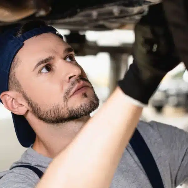 mechanic working on a tire