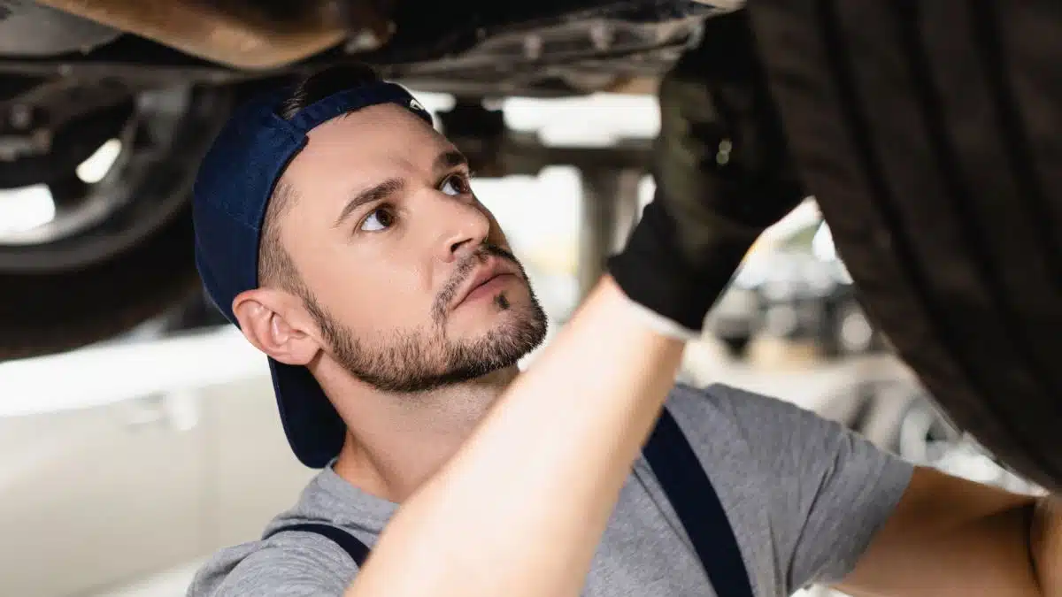 mechanic working on a tire