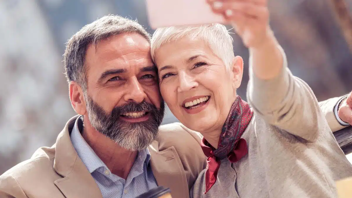 senior couple taking a selfie