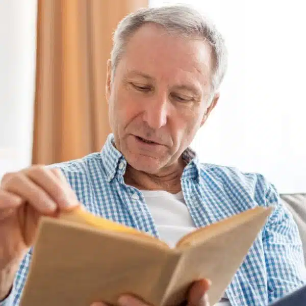 senior man reading a book